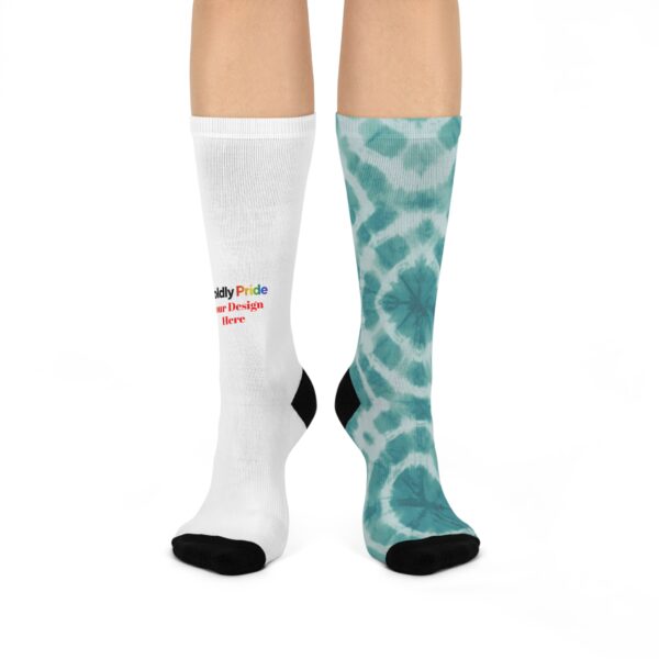 One cushioned crew sock with a printed design and the other sock showing the text “Customize Here” to indicate where your artwork can go.