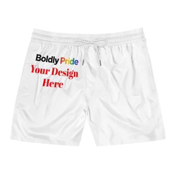 Men’s midlength swim shorts on a model standing by the water, showing a clean solid color and mid‑thigh fit.